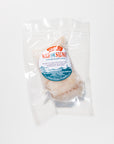 Packaged wild ling cod on a white background