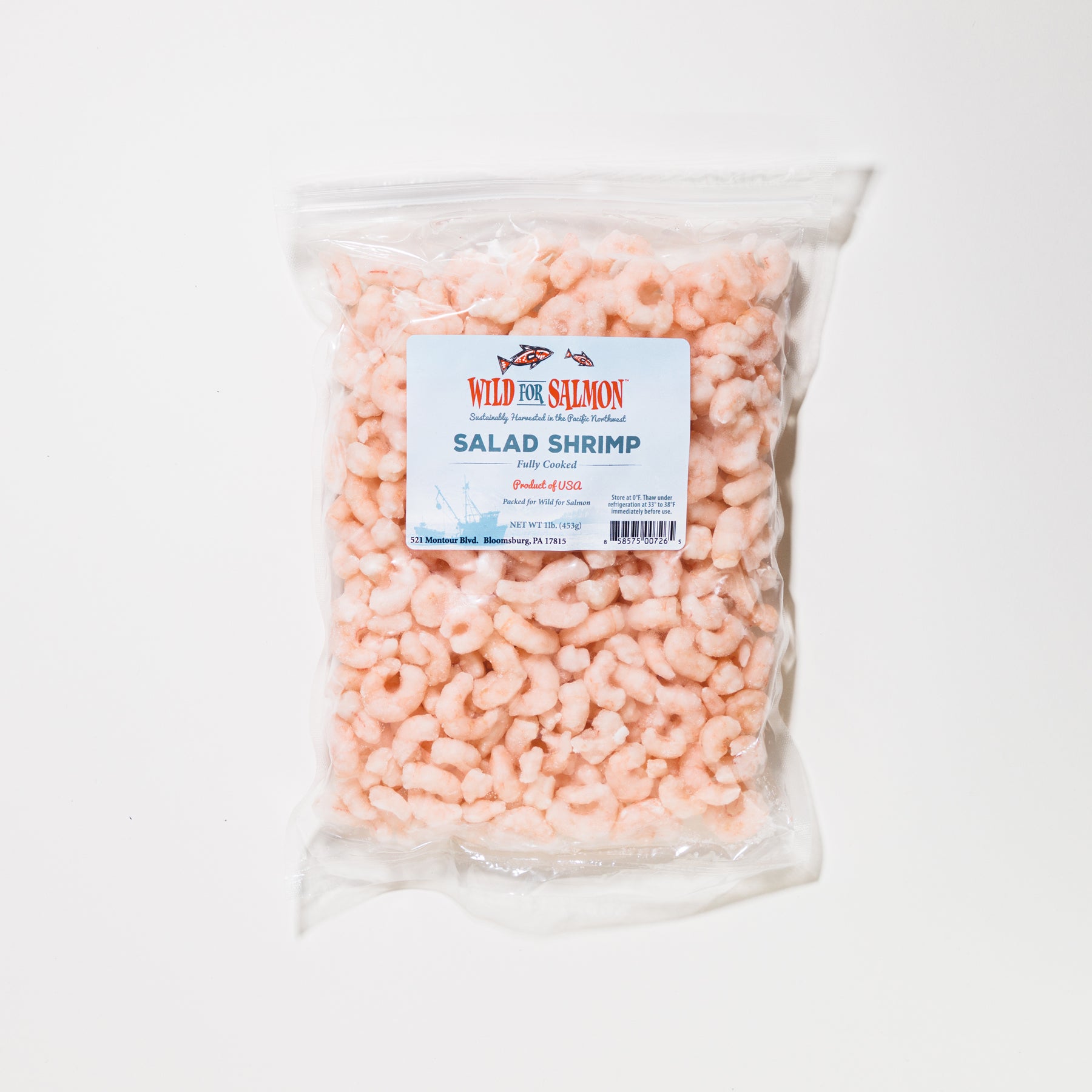 Packaged salad shrimp with a label on a white background