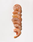 Raw shrimp on a white background