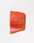 Raw keta salmon fillet on a white background