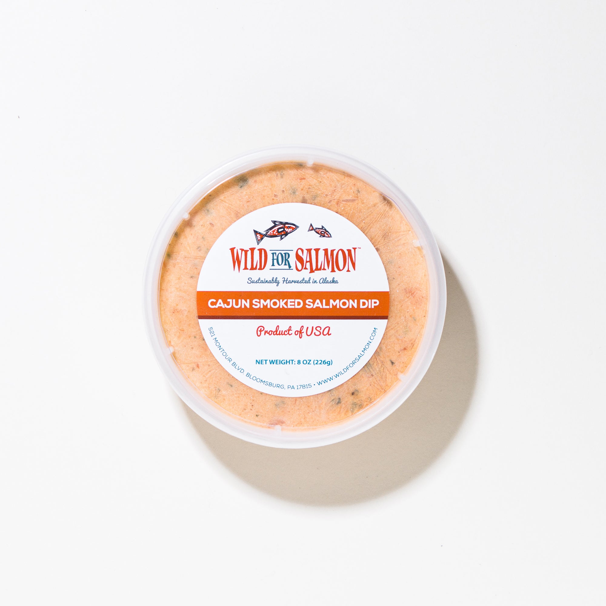 Cajun Smoked Salmon Dip container with 'Wild for Salmon' label on a white background