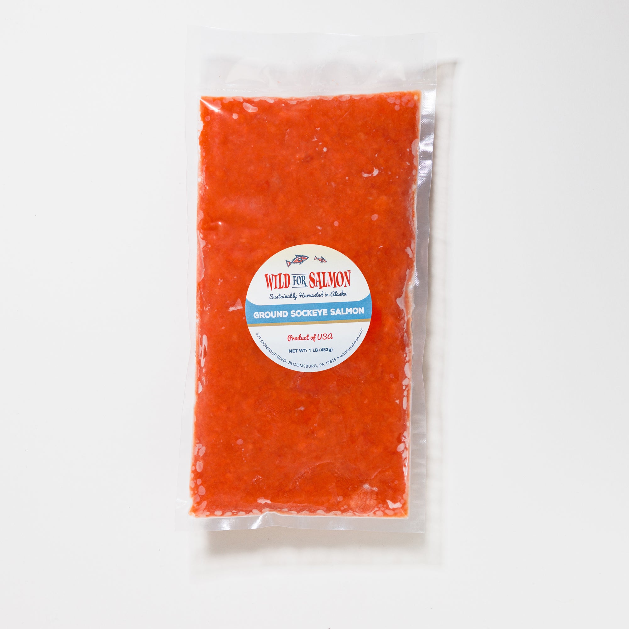 Packaged ground sockeye salmon with a label on a white background