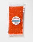 Packaged ground sockeye salmon with a label on a white background