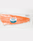 Packaged salmon fillet with a Wild for Salmon label on a white background