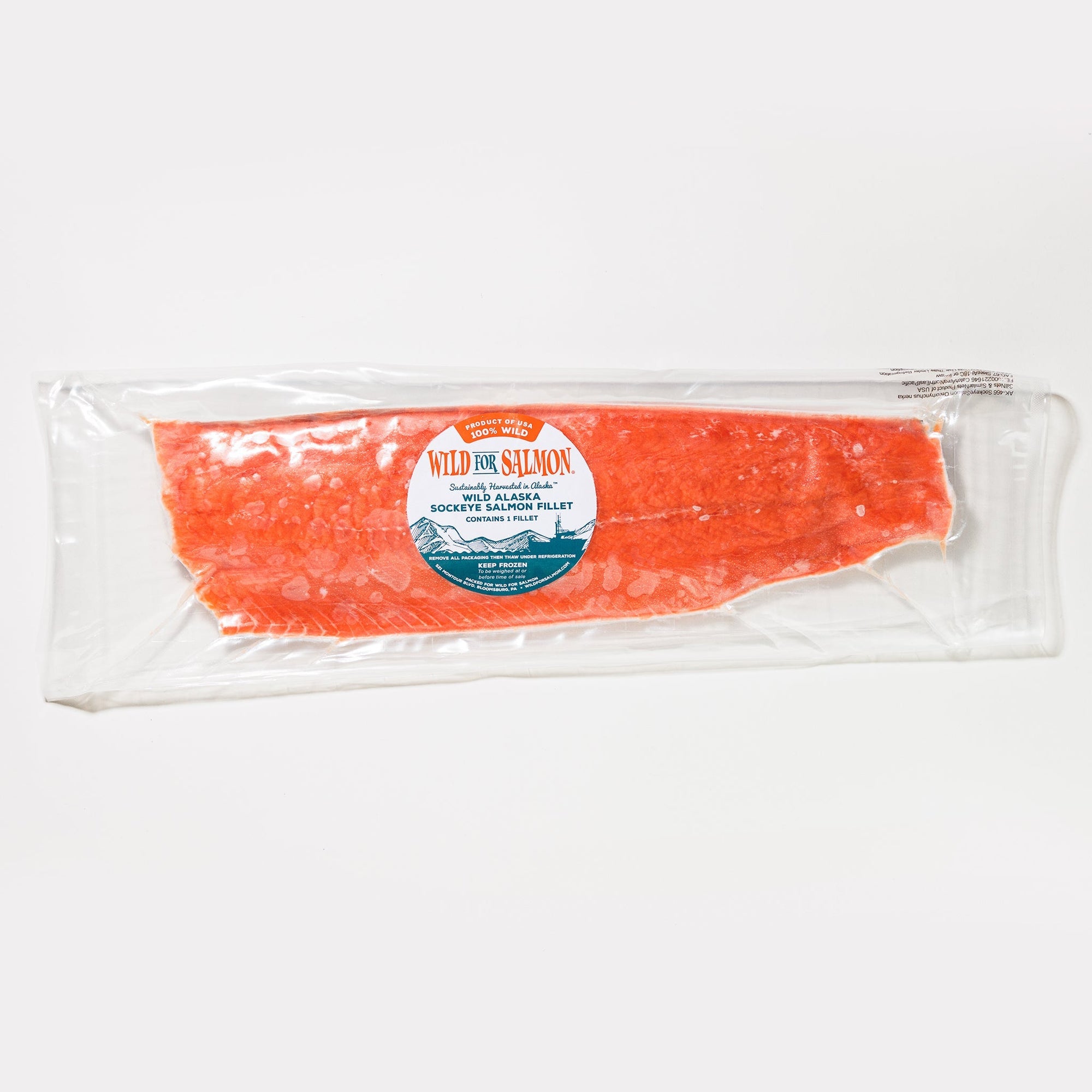 Packaged salmon fillet with a visible Wild for Salmon label on a white background