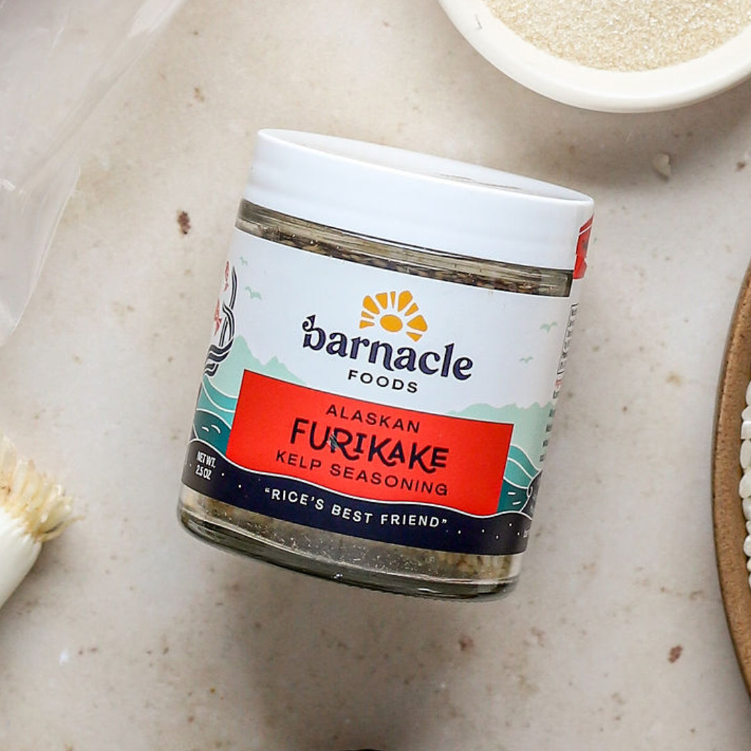 Jar of Barnacle Foods Alaskan Furikake Kelp Seasoning on a light surface